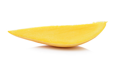 Slice of mango on a white background.の写真素材