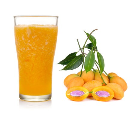 Marian plum juice and fruit isolation white background