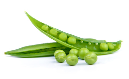 Fresh peas isolated on a white backgroundの写真素材