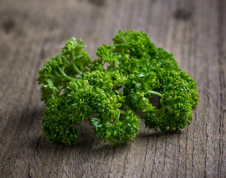 parsley on old woodenの写真素材