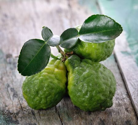 bergamot on wooden table background