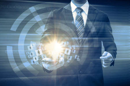 businessman holding smartphone world technology social mediaの写真素材