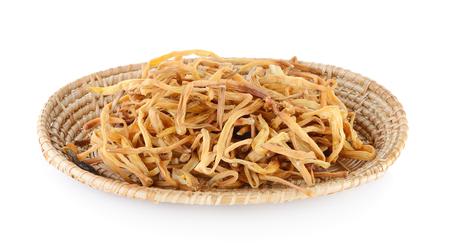Dried Day Lily in basket on white backgroundの写真素材