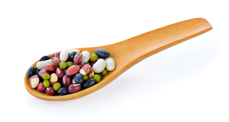 five mix beans in wood spoon on white backgroundの写真素材