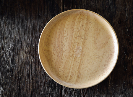 wood plate on woodenの写真素材