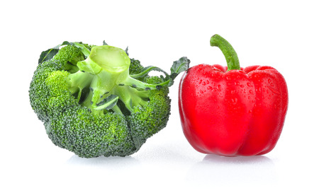red pepper and fresh broccoli isolated on white backgroundの写真素材
