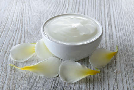 yogurt on woodの写真素材