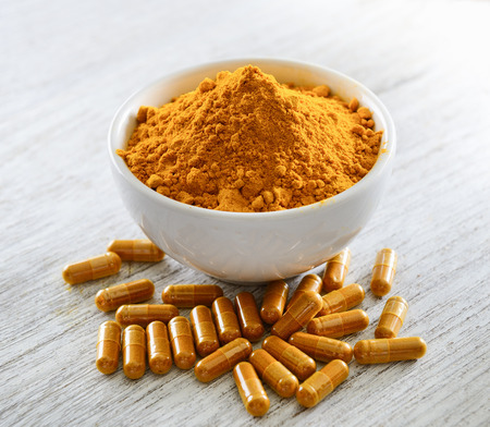 Turmeric powder and turmeric capsulesの写真素材