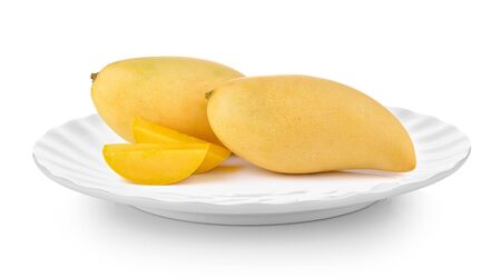 mango in plate on white backgroundの写真素材