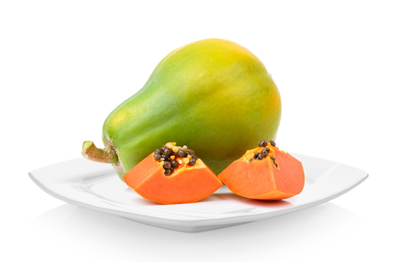 papaya in white plate on white backgroundの写真素材