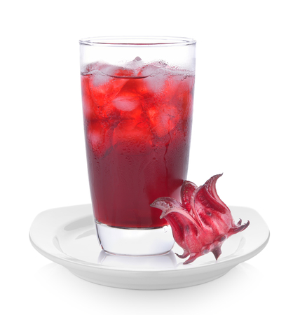 roselle flower juice in glass with ice isolated on white backgroundの写真素材