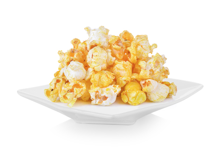Pop Corn in plate on white backgroundの写真素材