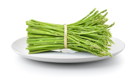 asparagus in plate isolated on a white backgroundの写真素材
