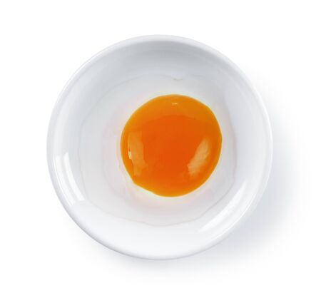 egg in plate on white backgroundの写真素材
