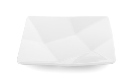 Beautiful shape ceramic plate on white backgroundの写真素材