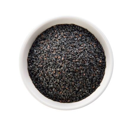 sesame in a bowl on white backgroundの写真素材