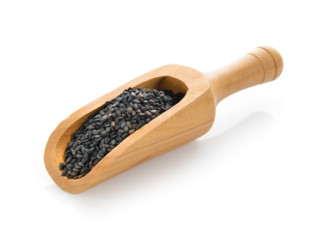 sesame in scoop on white backgroundの写真素材