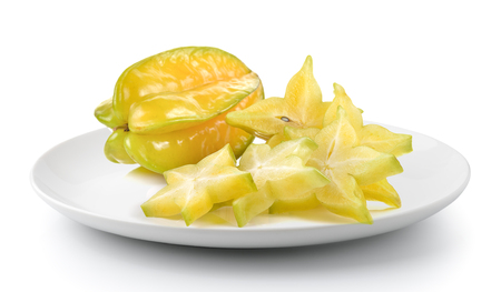 starapple in a plate isolated on a white backgroundの写真素材