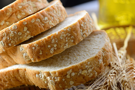 Whole wheat bread cut on slicesの写真素材