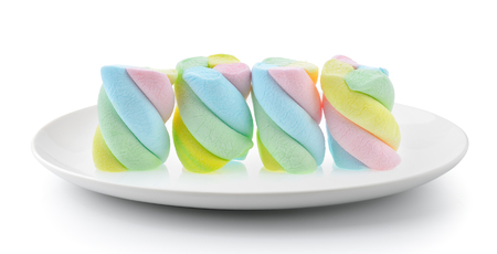 Marshmallows in a plate isolated on a white backgroundの写真素材