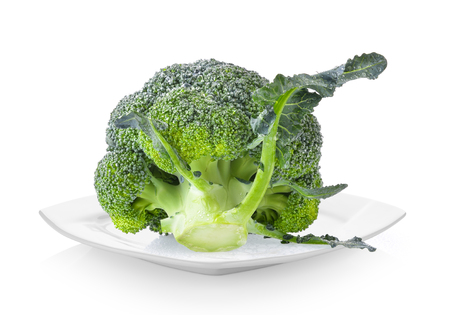 Fresh broccoli in white plate on white backgroundの写真素材