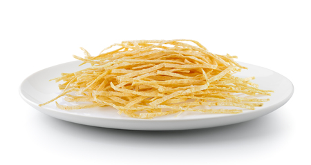 dried fish snack in a  plate isolated on a white backgroundの写真素材