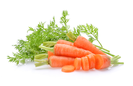 Carrot vegetable with leaves isolated on white backgroundの写真素材