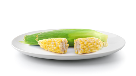 corn in a plate isolated on a white backgroundの写真素材