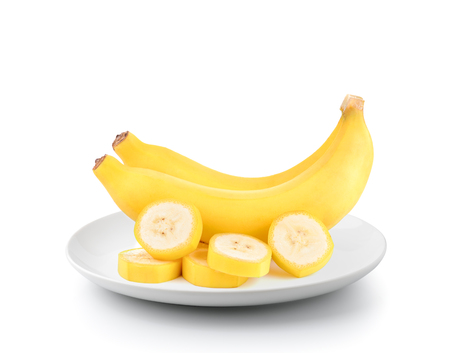 bananas in a  plate isolated on a white backgroundの写真素材