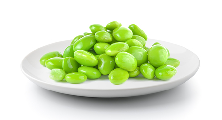 soy beans in a plate isolated on a white backgroundの写真素材