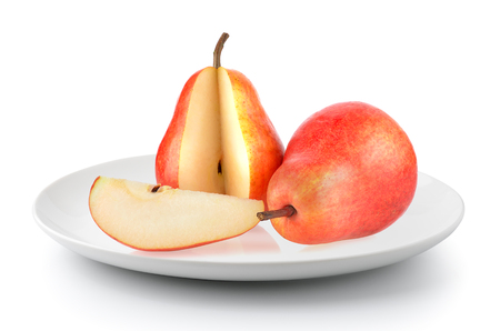 pear in a plate isolated on a white backgroundの写真素材