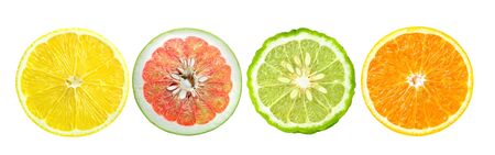 Citrus fruit. Orange, lemon, bergamot. Slices isolated on white backgroundの写真素材