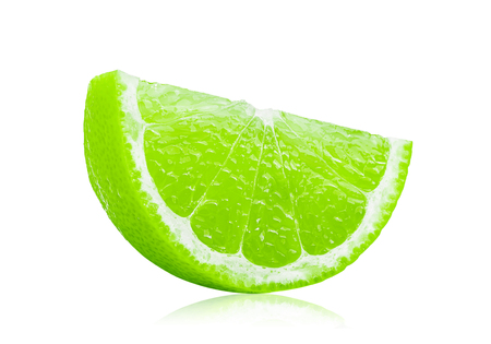 Juicy slice of lime isolated on white backgroundの写真素材
