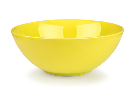 yellow bowl on whiteの写真素材
