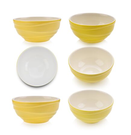 yellow bowl on white backgroundの写真素材