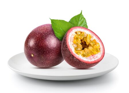 passionfruits in plate isolated on a white backgroundの写真素材