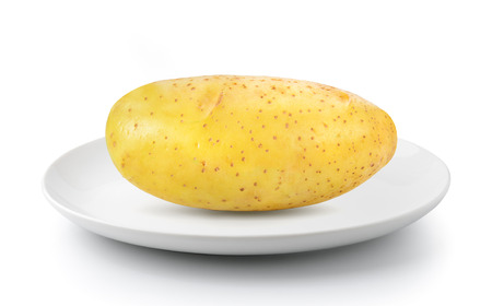 potato in a plate isolated on a white backgroundの写真素材