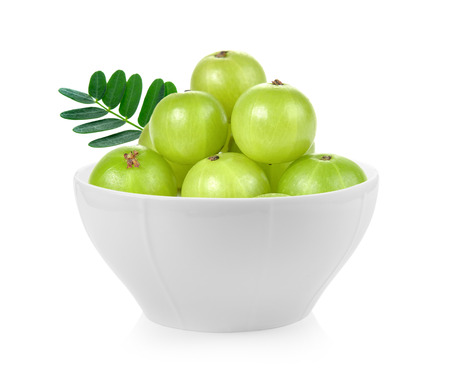 Indian gooseberry  in a bowl on white backgroundの写真素材