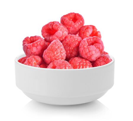 raspberry in a  bowl on white backgroundの写真素材