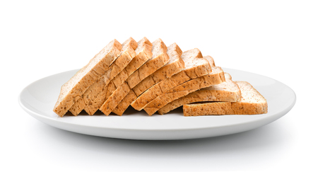 sliced bread in a plate isolated on a white background の写真素材