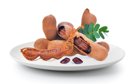 Tamarind in a plate isolated on a white backgroundの写真素材