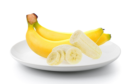 bananas in a plate on white backgroundの写真素材