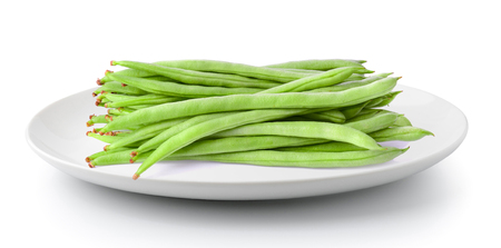 Green beans in a plate isolated on a white backgroundの写真素材