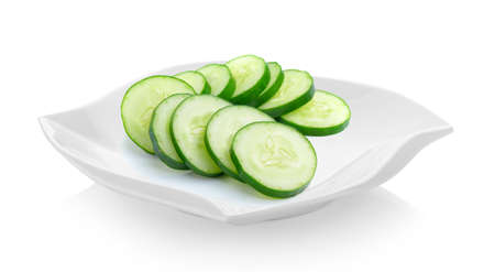 slices cucumber in a plate (beautiful shape) on white backgroundの写真素材