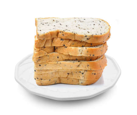 whole wheat bread in a plate on white backgroundの写真素材