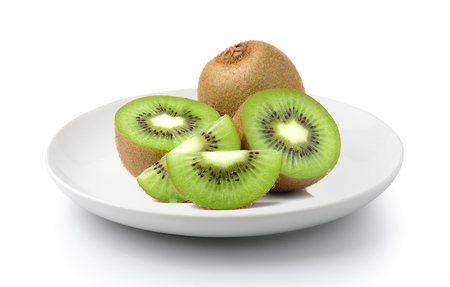 Kiwi fruits slice in a plate isolated on a white backgroundの写真素材