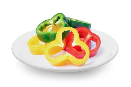 pepper slices in a plate on white backgroundの写真素材