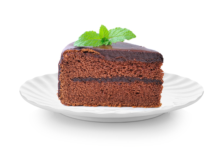 piece of chocolate cake in white plate on white backgroundの写真素材