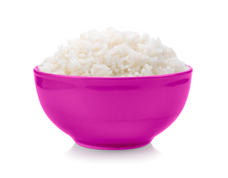 rice in pink bowl on white backgroundの写真素材