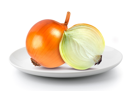 onions in  plate isolated on a white backgroundの写真素材